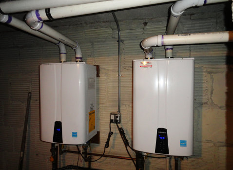 Along with tankless heaters, a new Peerless gas boiler was installed for this oil to gas conversion customer in JC, NJ.